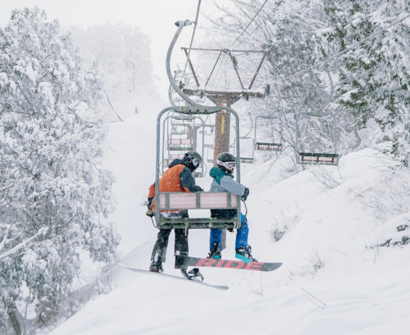 Atwo people on chairlift