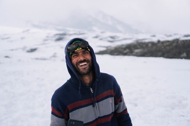 man in snow smiling