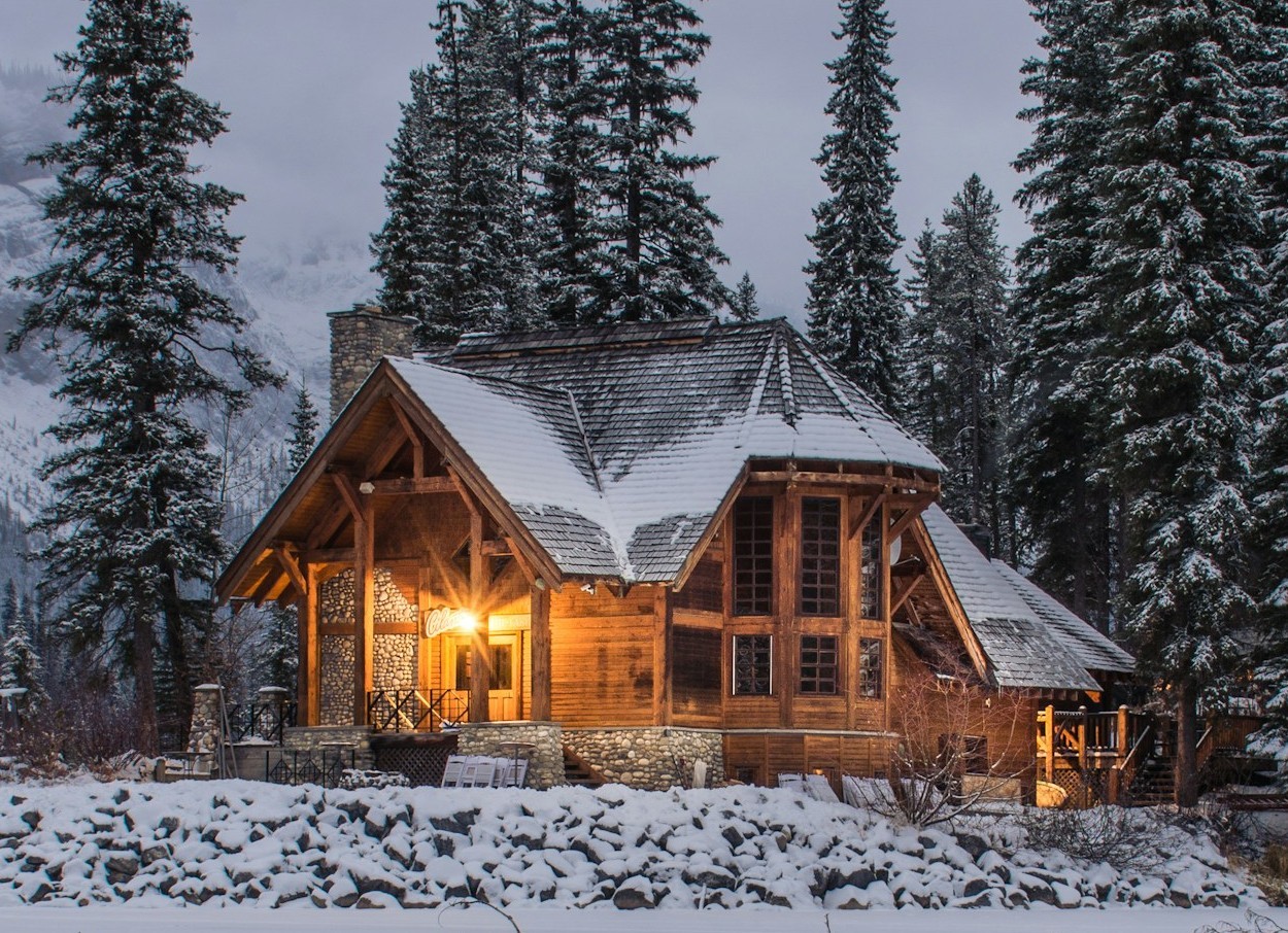 A large cabin in snow