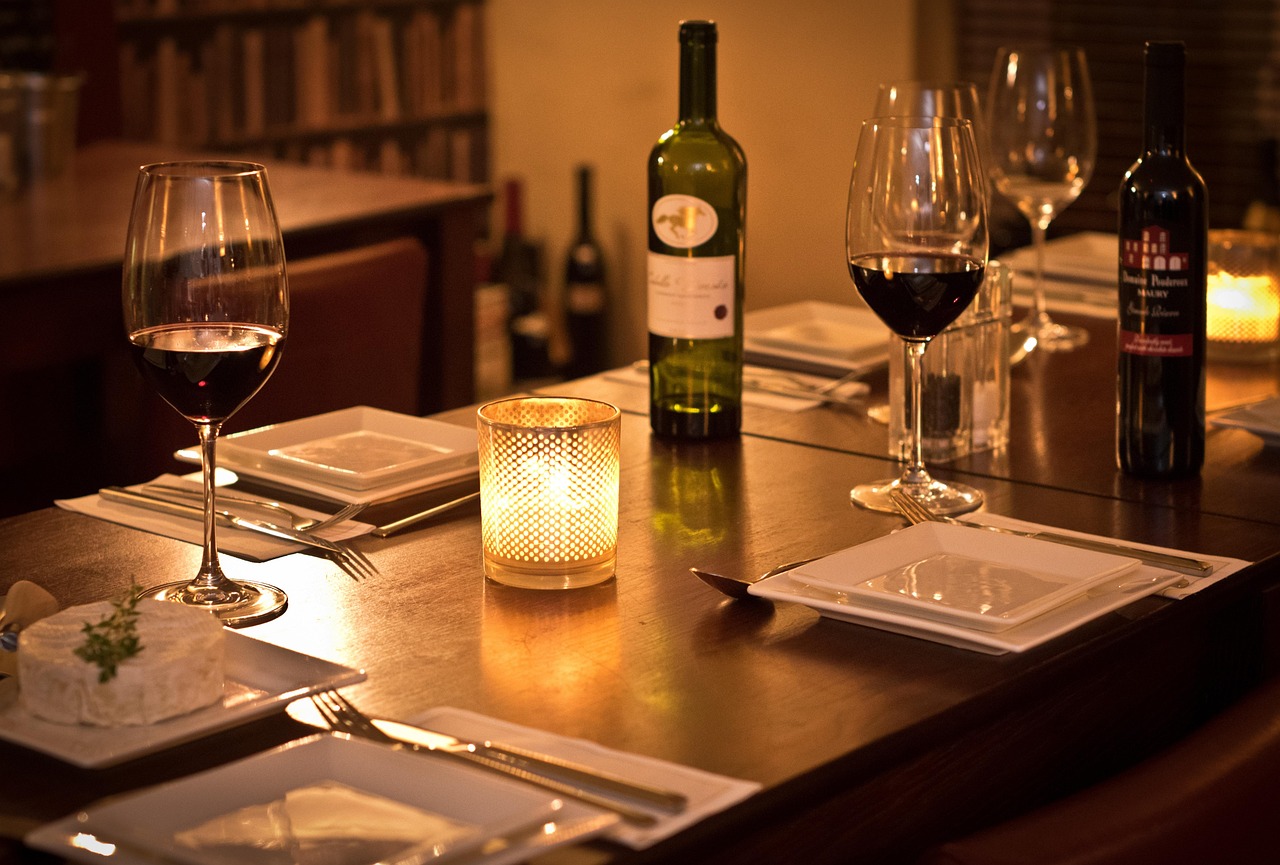 Wine bottle and glass on table